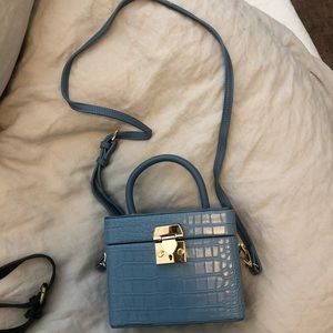 Light blue square croc purse